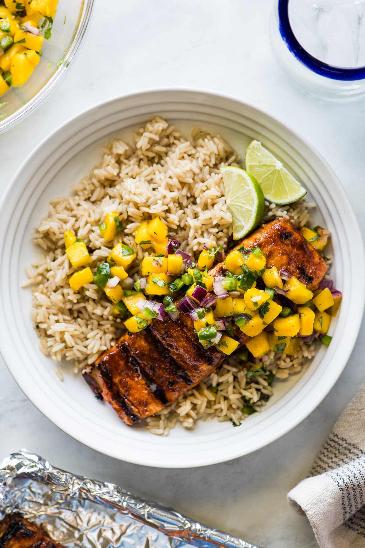Chili Garlic Grilled Salmon topped with mango salsa.