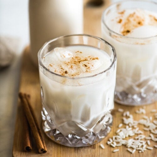 A glass of horchata on a table.
