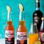 Corona sunrise drink (as seen on TikTok) with lime wedge in bottle.