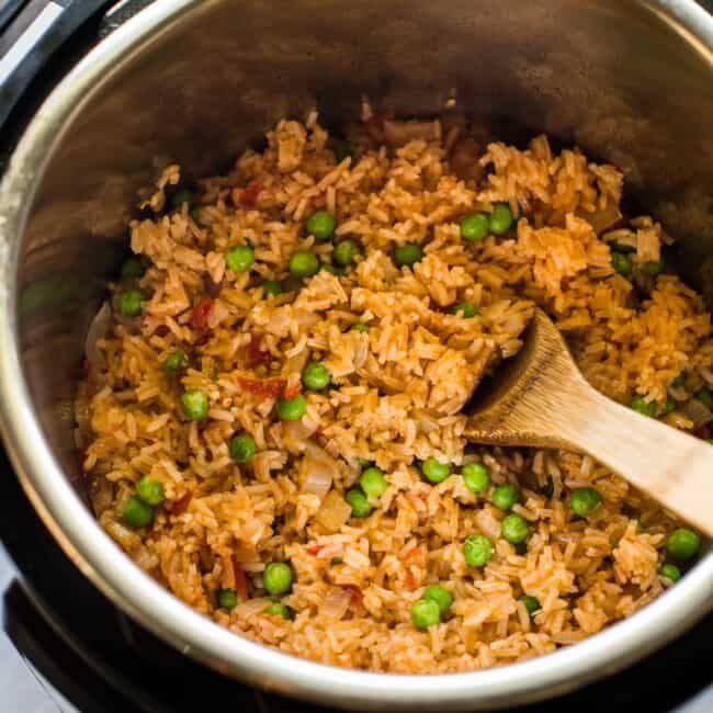 Instant Pot Mexican Rice with peas in the pressure cooker.