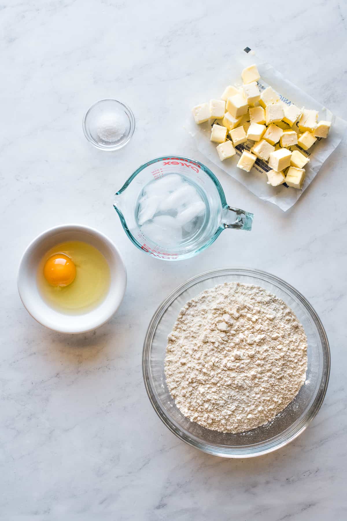 Ingredients for empanada dough on a table.