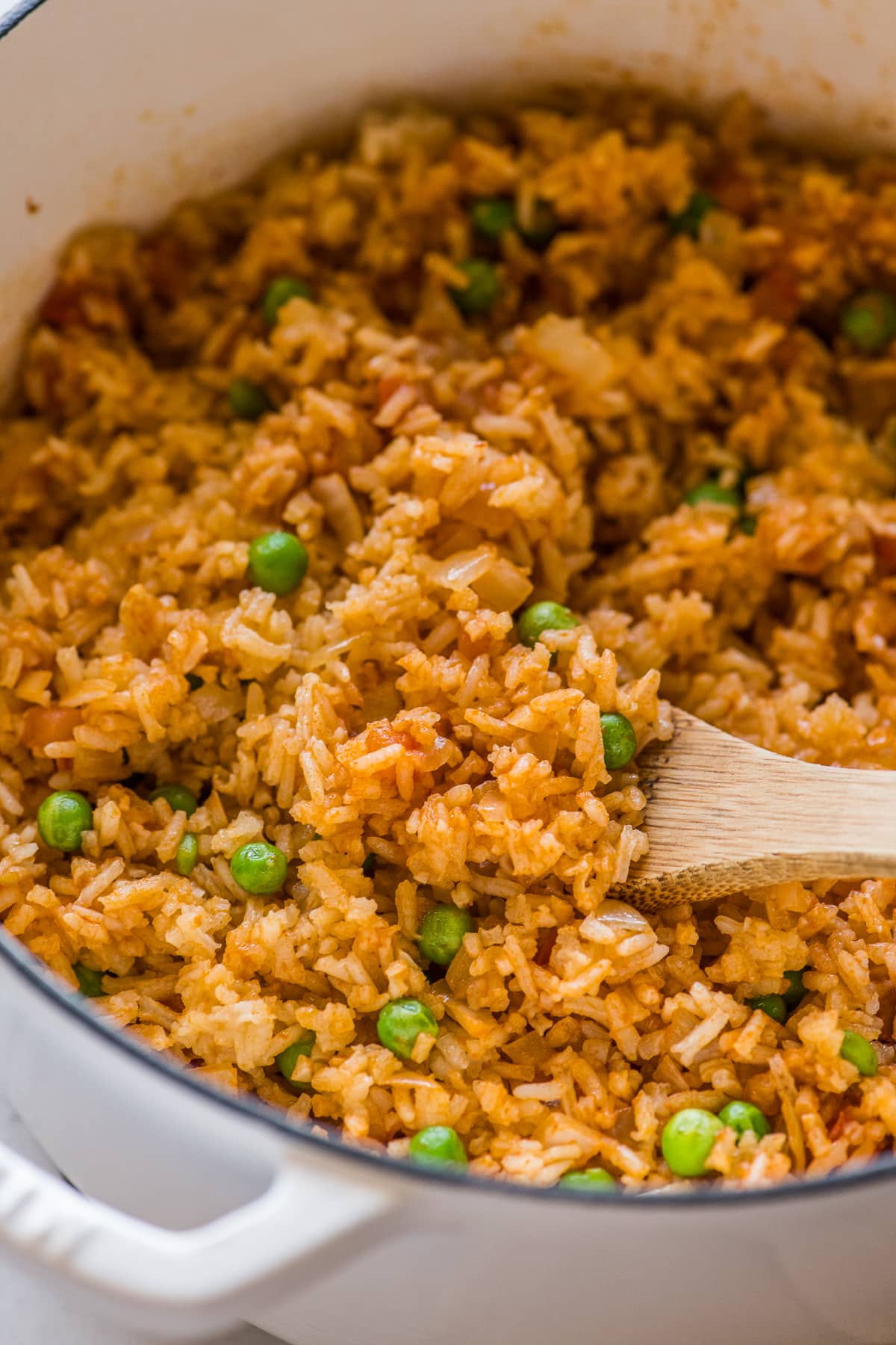 Authentic Mexican Rice with peas in a pot.