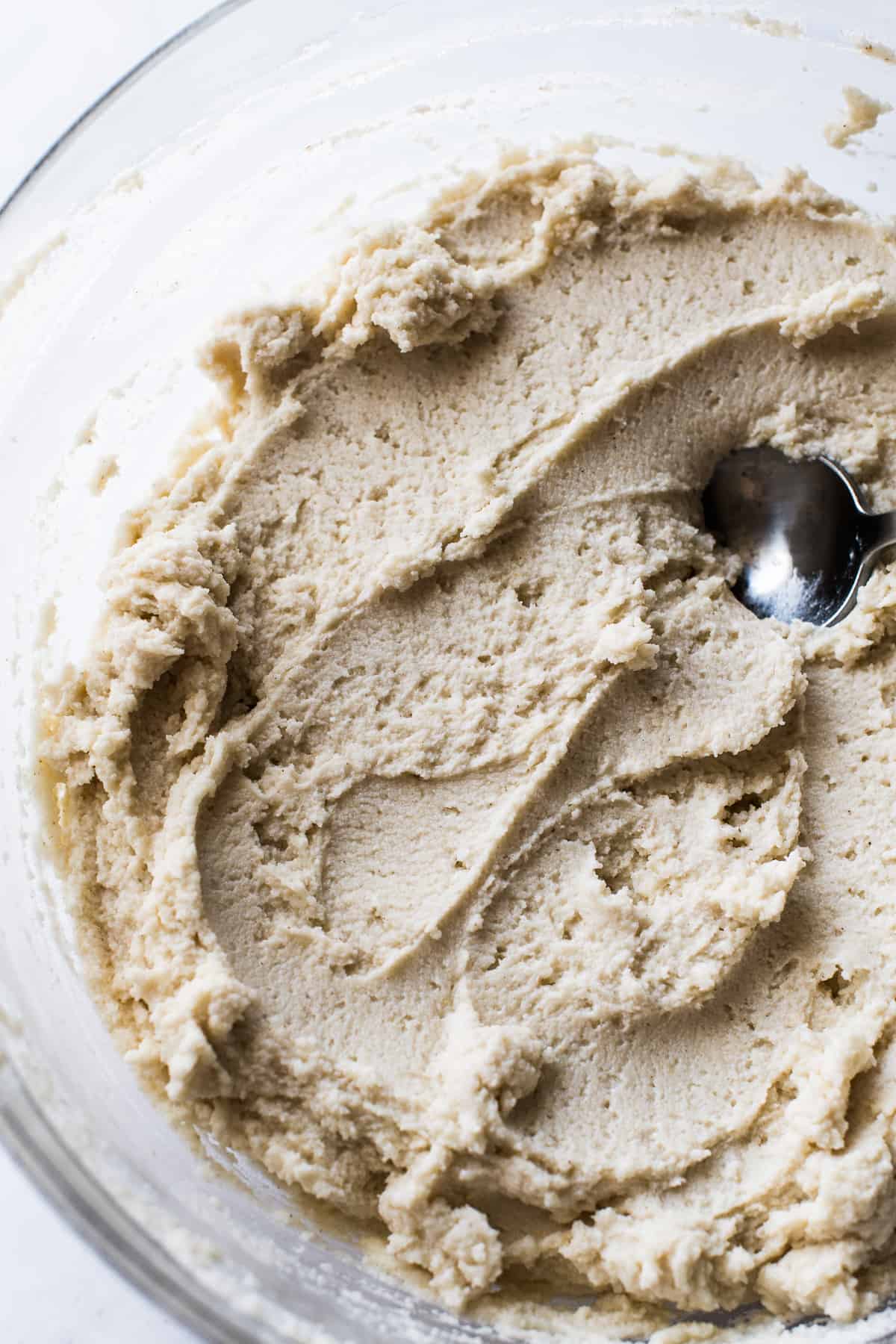 Masa dough for tamales in a bowl.