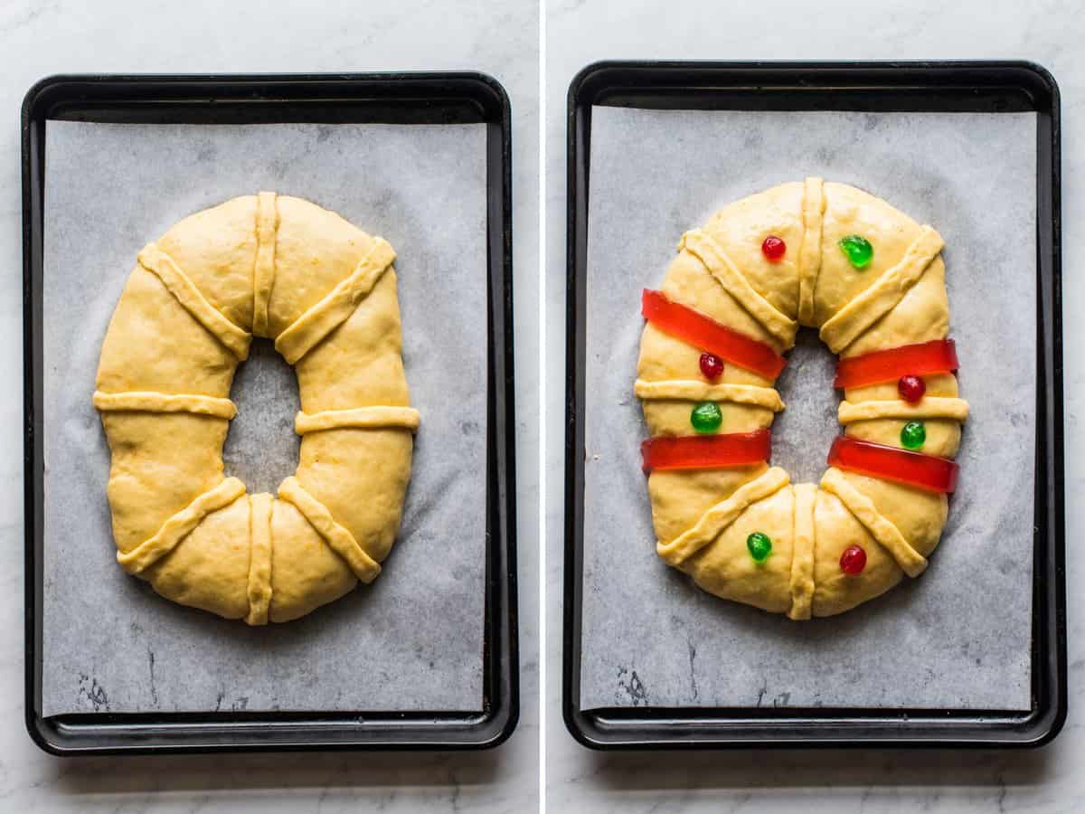 Rosca de Reyes being decorated on a sheet pan.