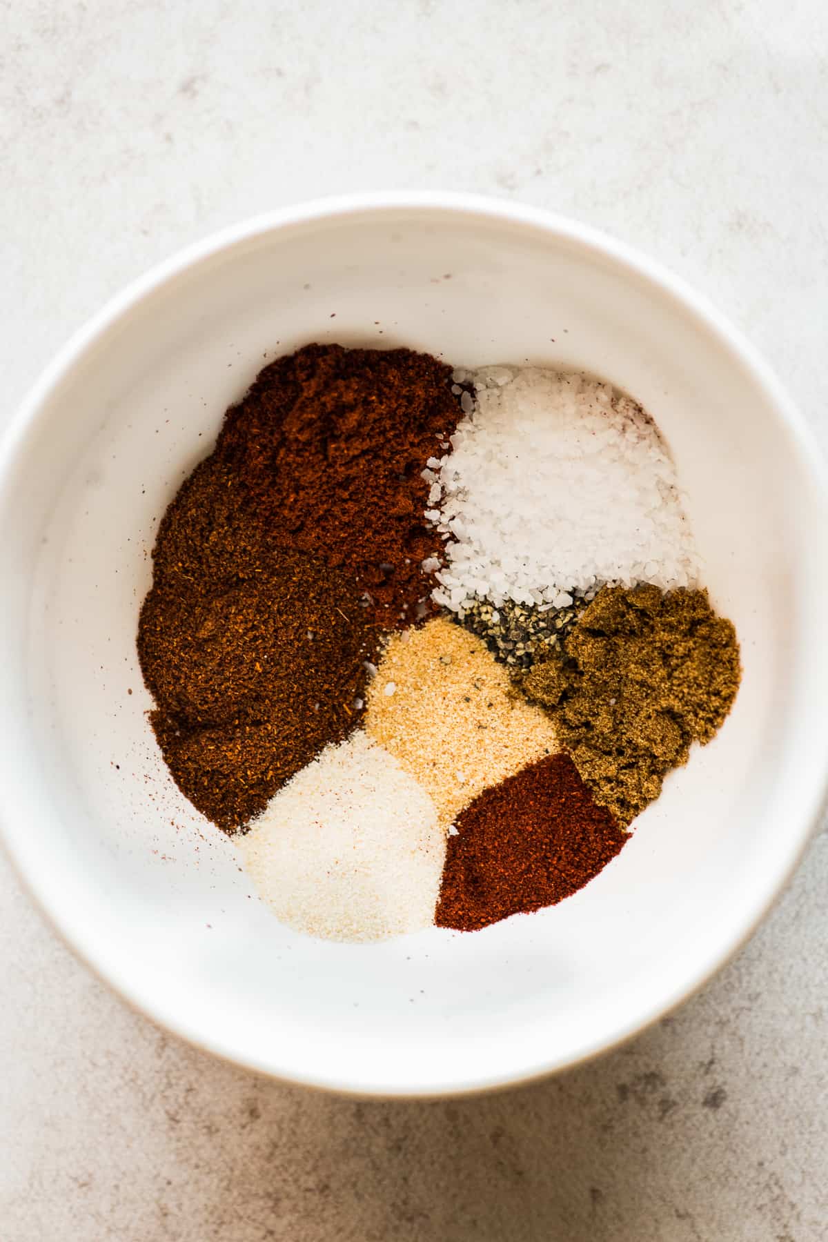 Spices in a small bowl for seasoning cauliflower tacos.