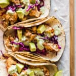 Cauliflower Tacos topped with a cilantro lime cashew crema.