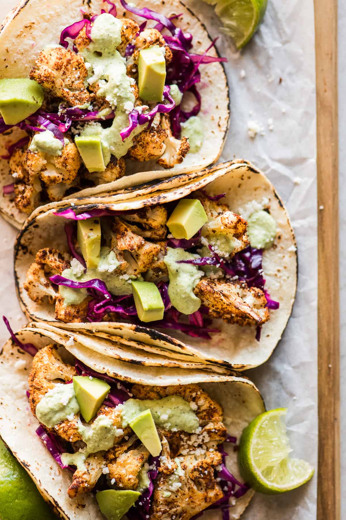 Cauliflower Tacos topped with a cilantro lime cashew crema.