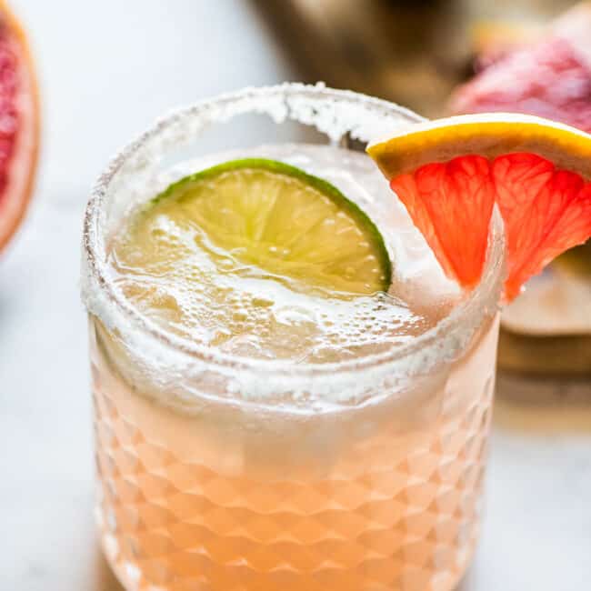 Paloma recipe made with tequila, grapefruit juice, lime juice, and sparkling water or club soda.