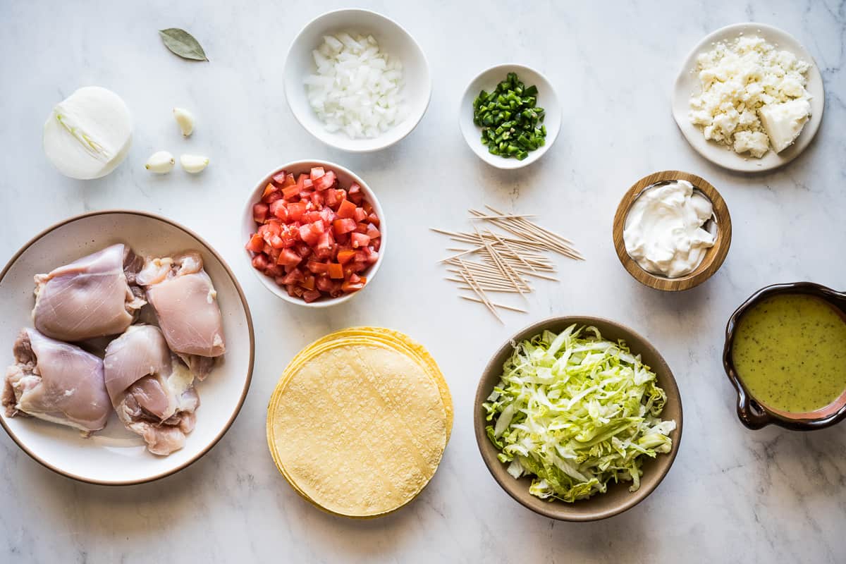 Ingredients for flautas on a table.