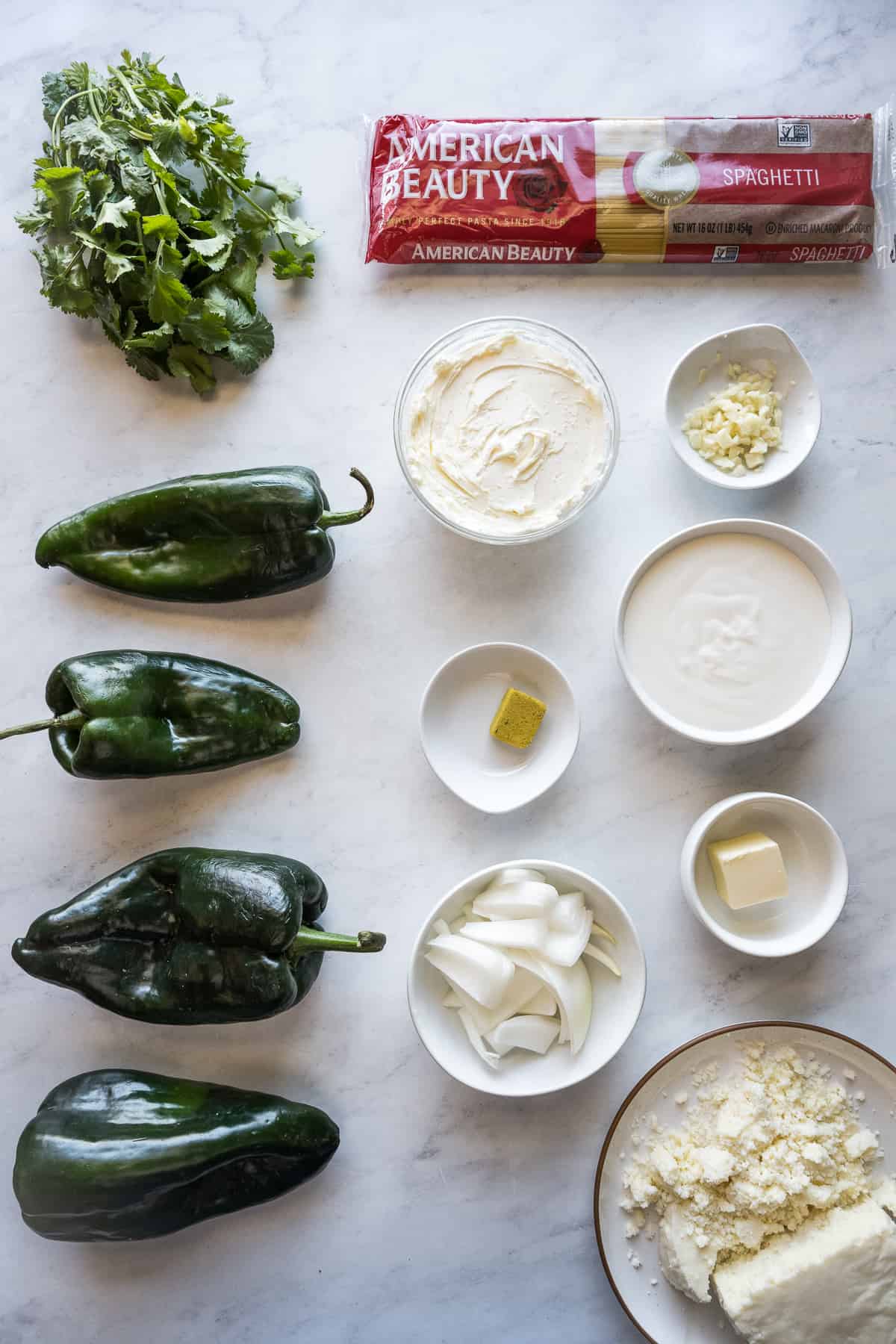 Ingredients for Mexican Green Spaghetti (Espagueti Verde) on a table.
