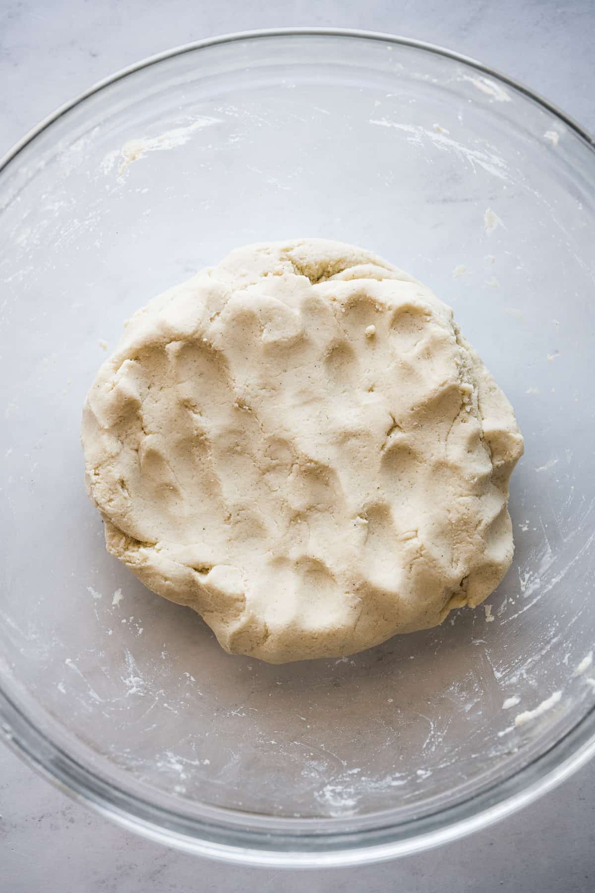 Masa dough in a glass bowl.