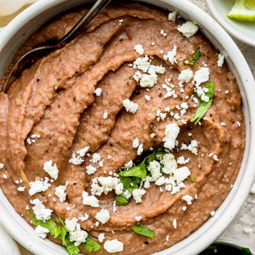 Refried beans in a bowl.
