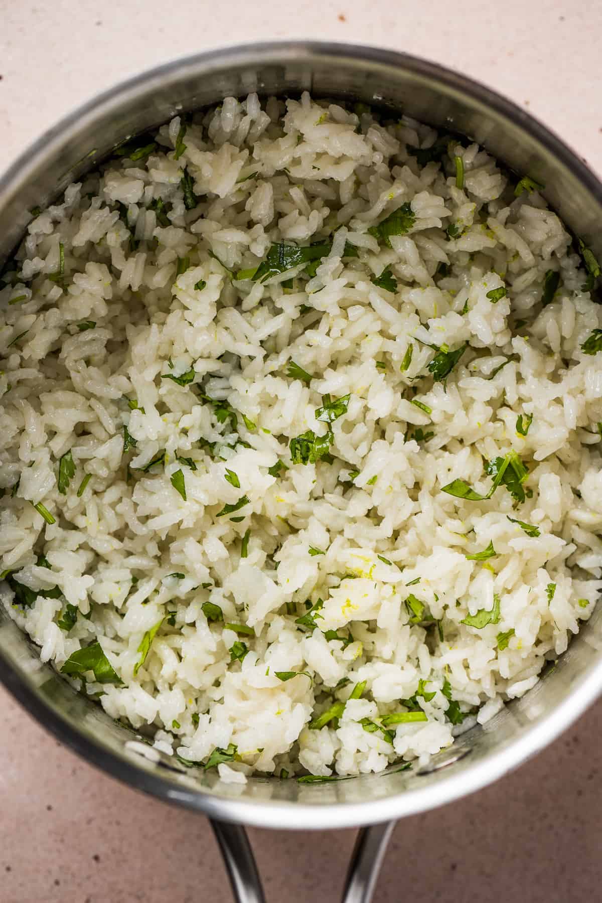 Cooked rice with cilantro, lime juice, and lime zest mixed in