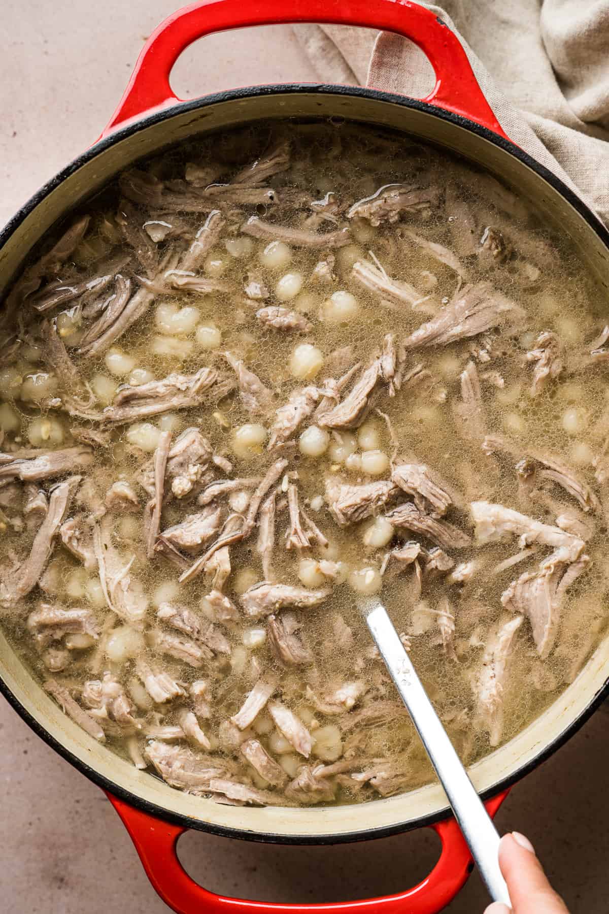 Pozole blanco in a pot ready to be served