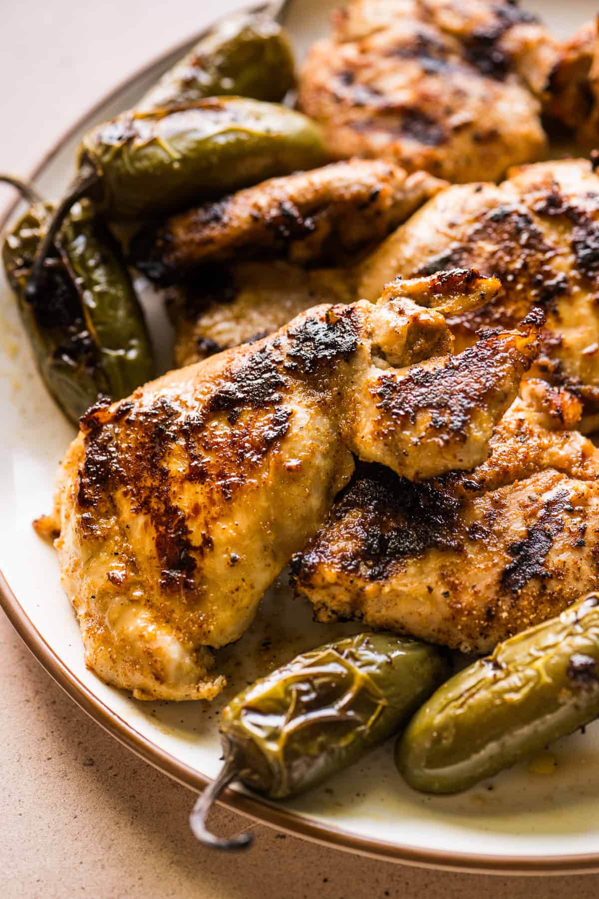 Cooked chicken made from a chicken marinade on a plate ready to be served.