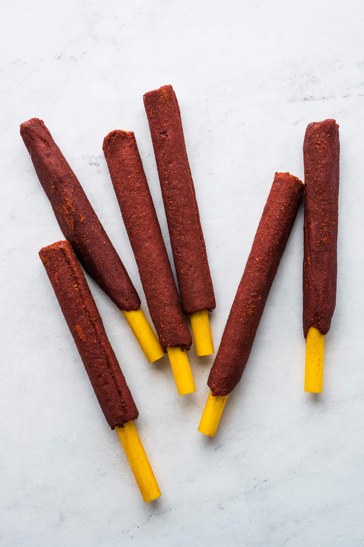 Mexican tamarind candy straws on a table.