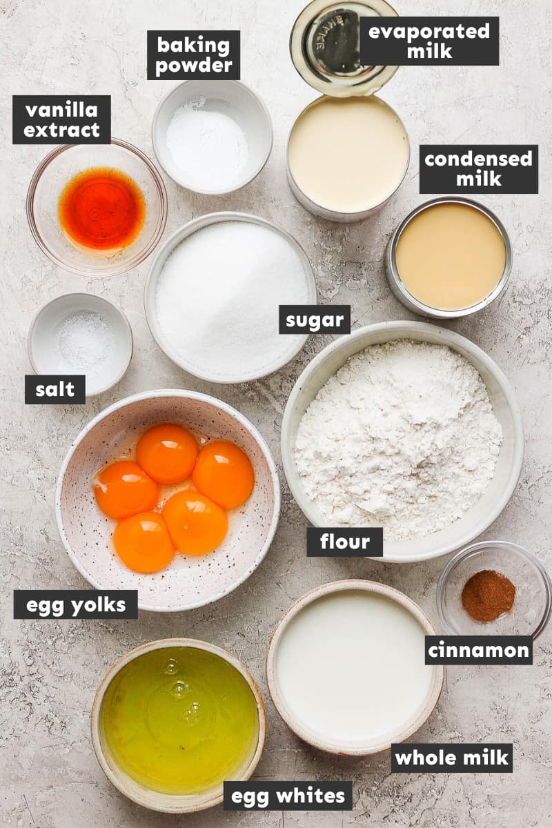 Ingredients in tres leches cake on a table.