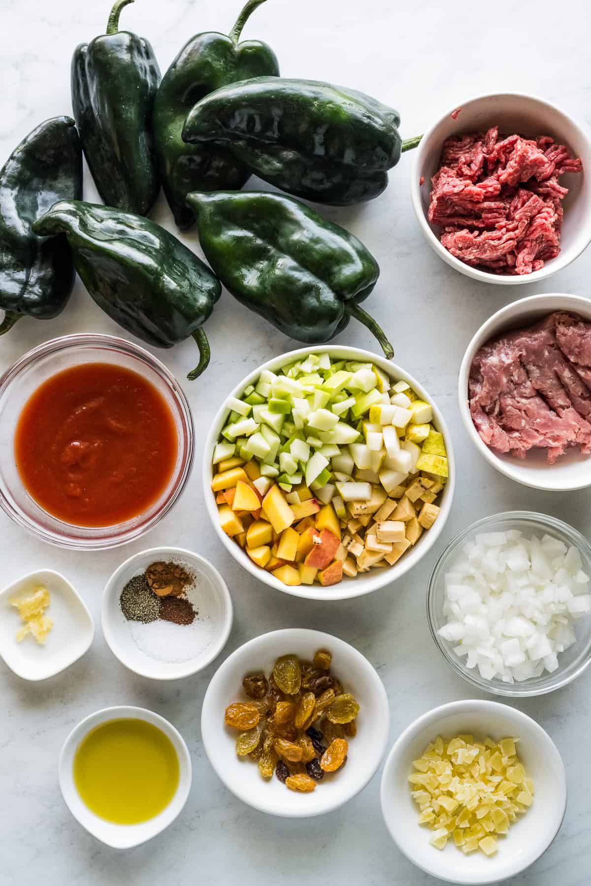 Ingredients for chiles en nogada chiles on a table.