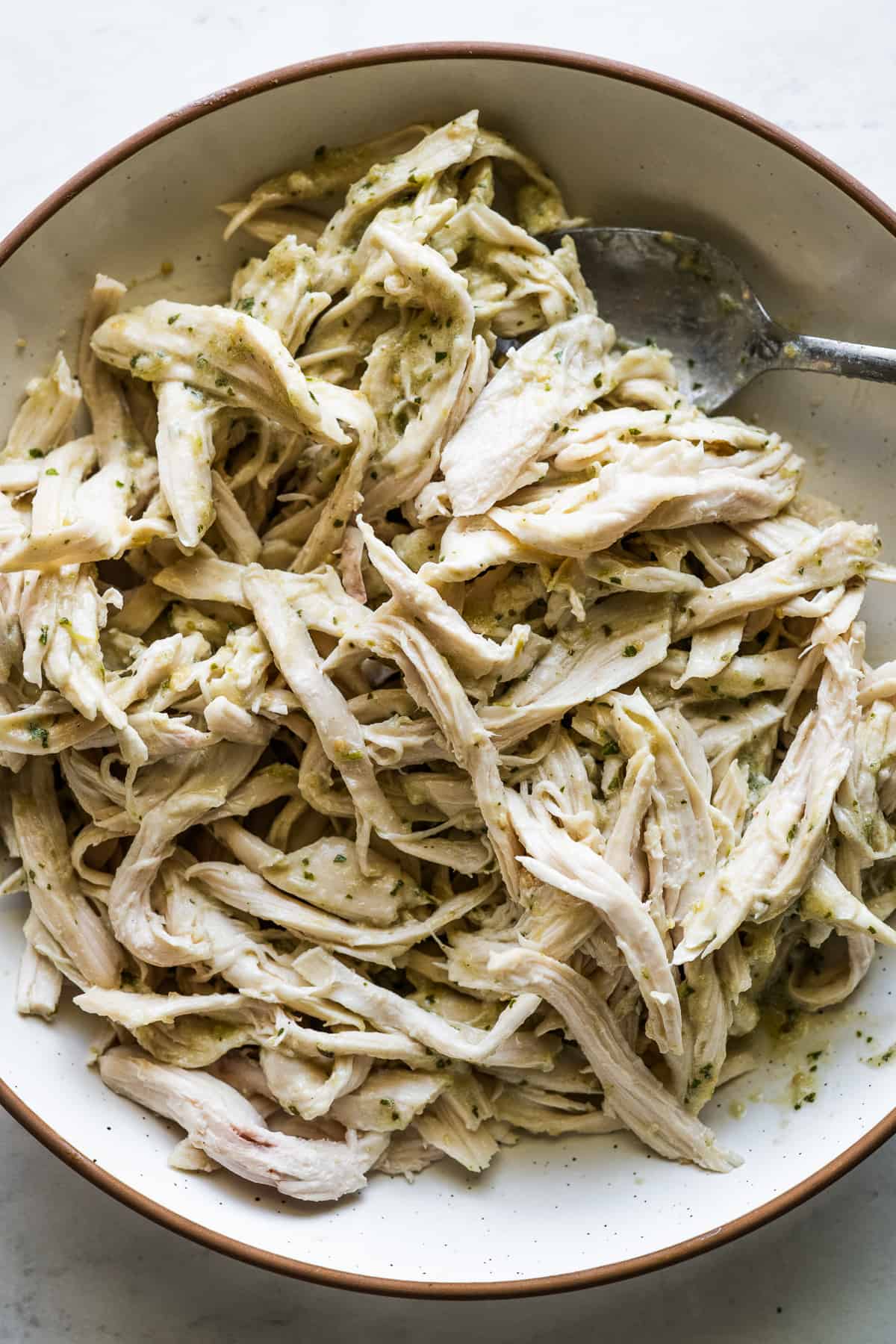 Shredded chicken tossed in a creamy green sauce.