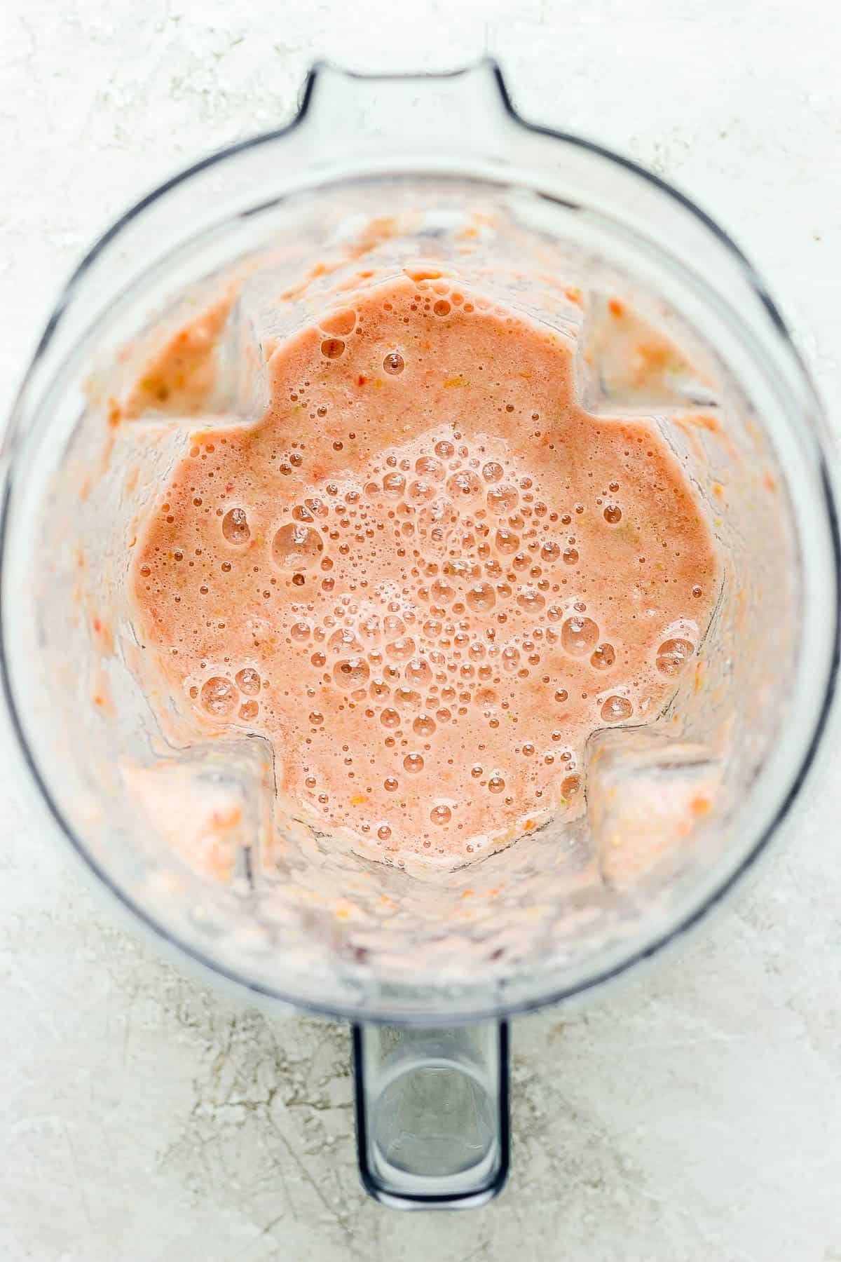 Blended tomato sauce in a blender for picadillo.