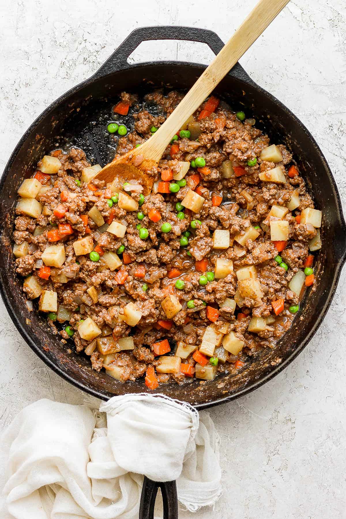 Picadillo in a cast iron skillet ready to be served.