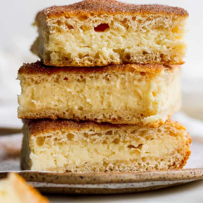 Sopapilla Cheesecake stacked on top of one another.