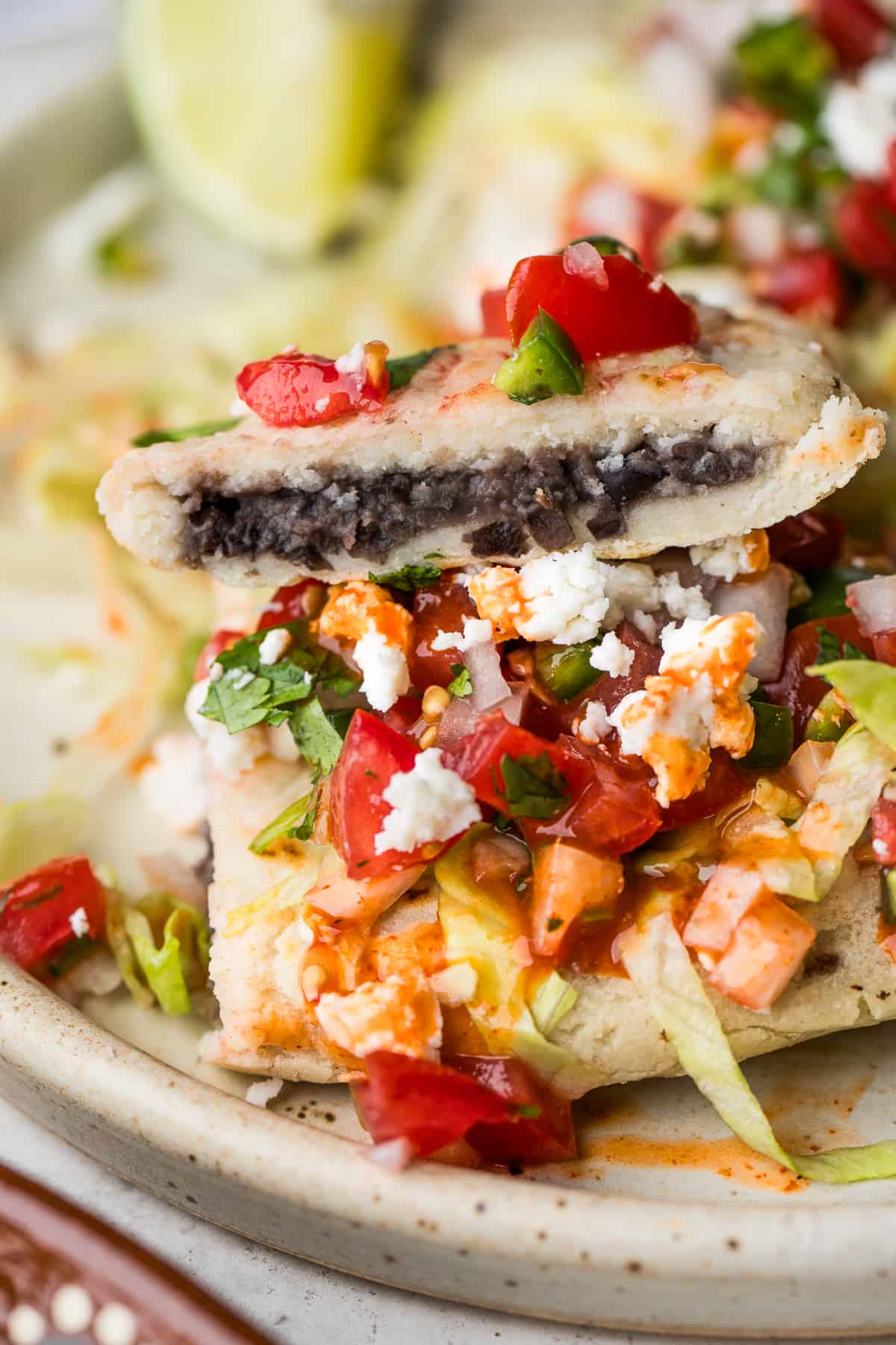 Refried beans in the middle of a tlacoyo.