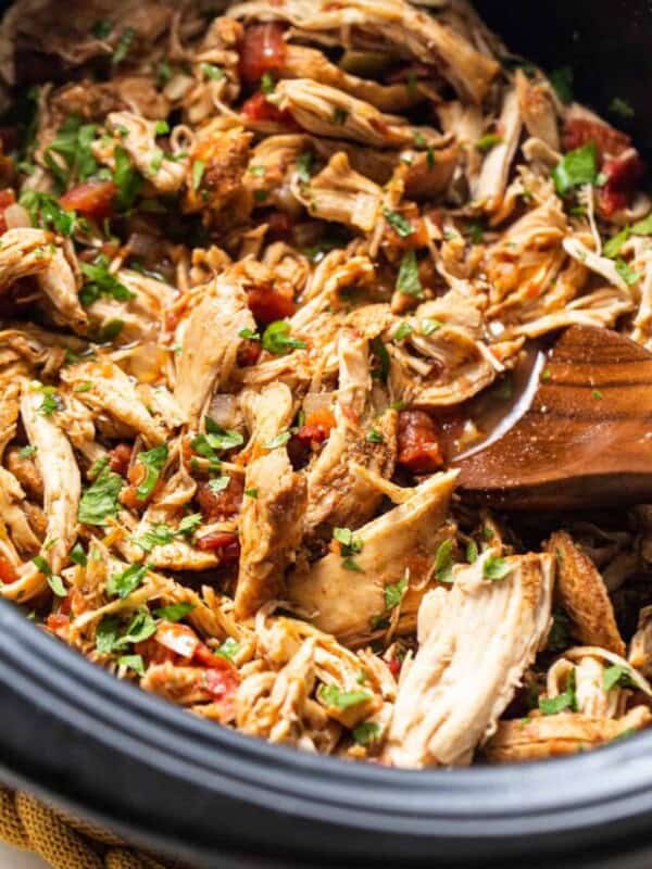 Crockpot chicken tacos in a slow cooker.