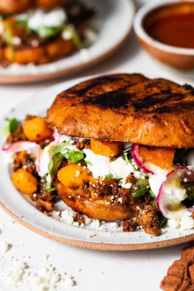 Pambazos on a plate with a chorizo and potato filling.