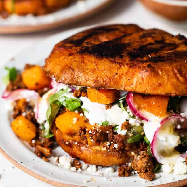 Pambazos on a plate with a chorizo and potato filling.