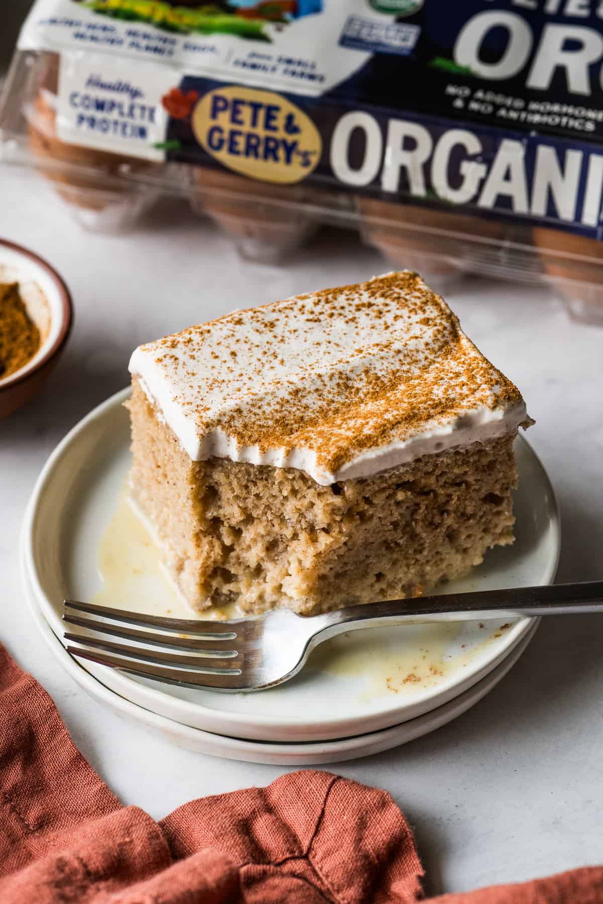 Apple tres leches cake on a table.