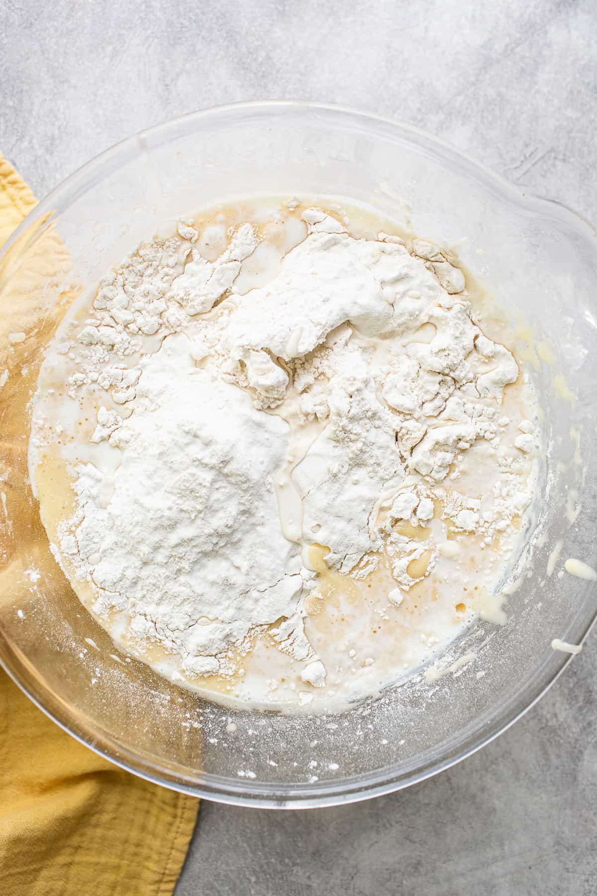 Cortadillo cake batter in a large bowl being mixed.