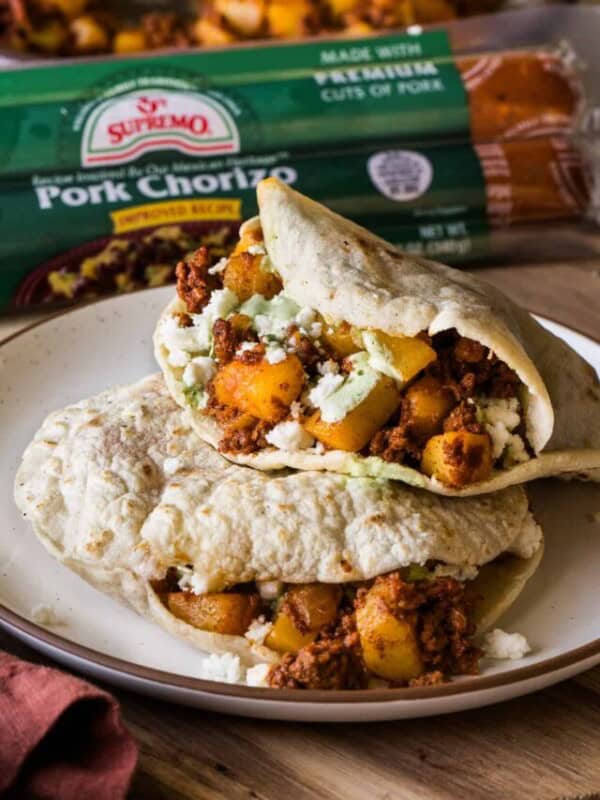 Gorditas filled with papas con chorizo on a plate.