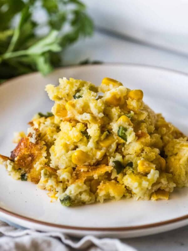 Green Chili Corn Casserole on a plate ready to eat.