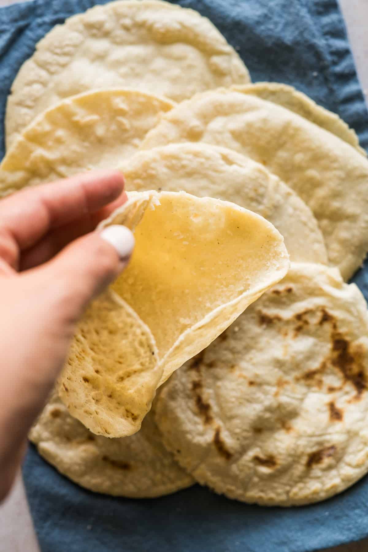 A gordita sliced open and ready to be filled.