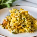 Green Chili Corn Casserole on a plate ready to eat.