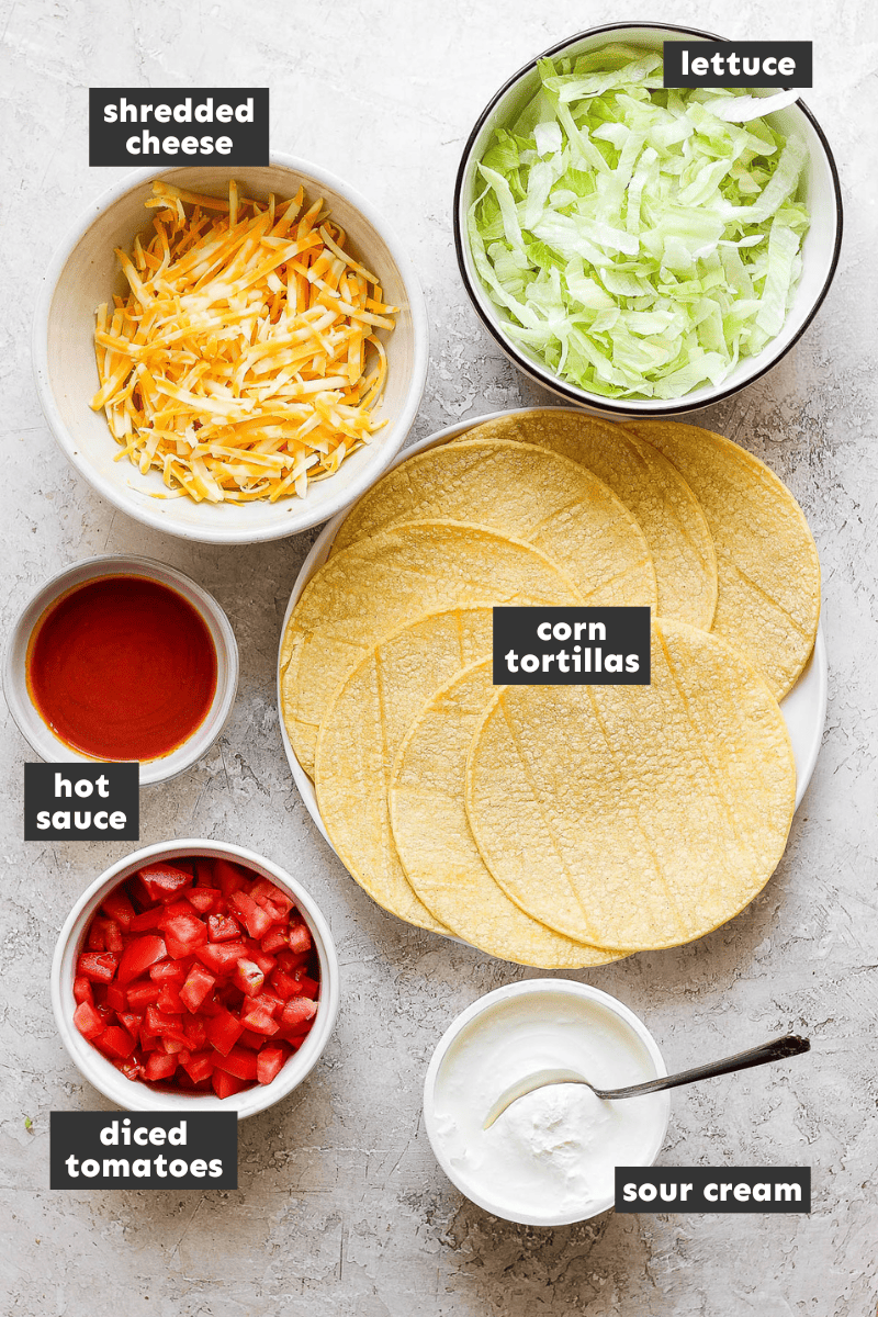 Ground turkey taco toppings on a table.