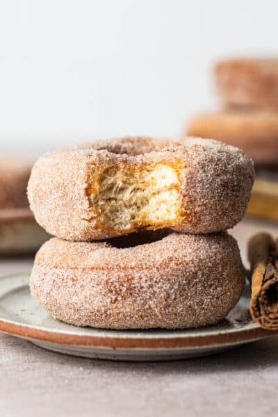 Mexican donuts (donas) stacked on top of one another.