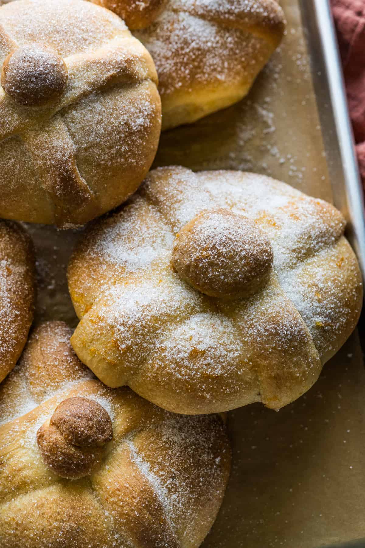 Premium Photo  Three pieces of pan de muerto. day of the dead