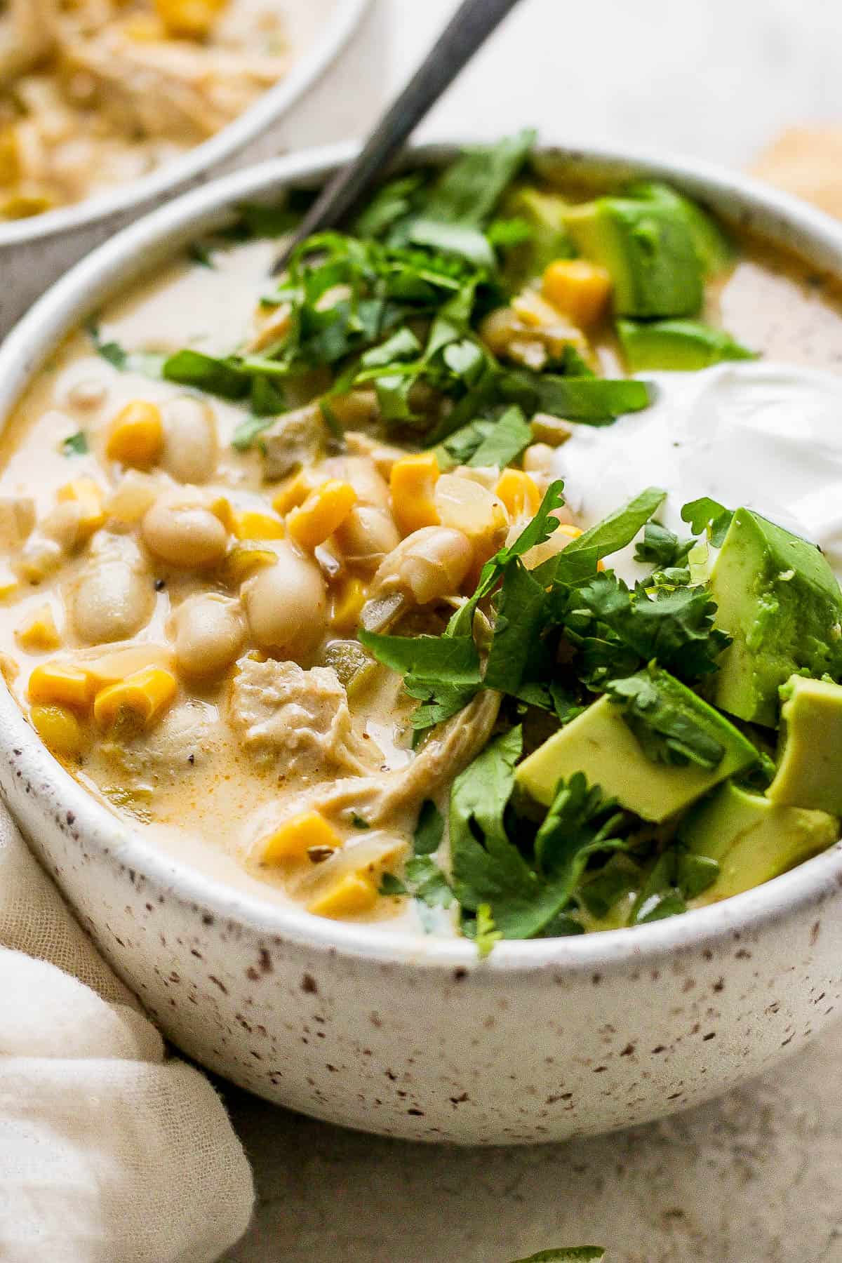 White chicken chili in a bowl ready to eat.