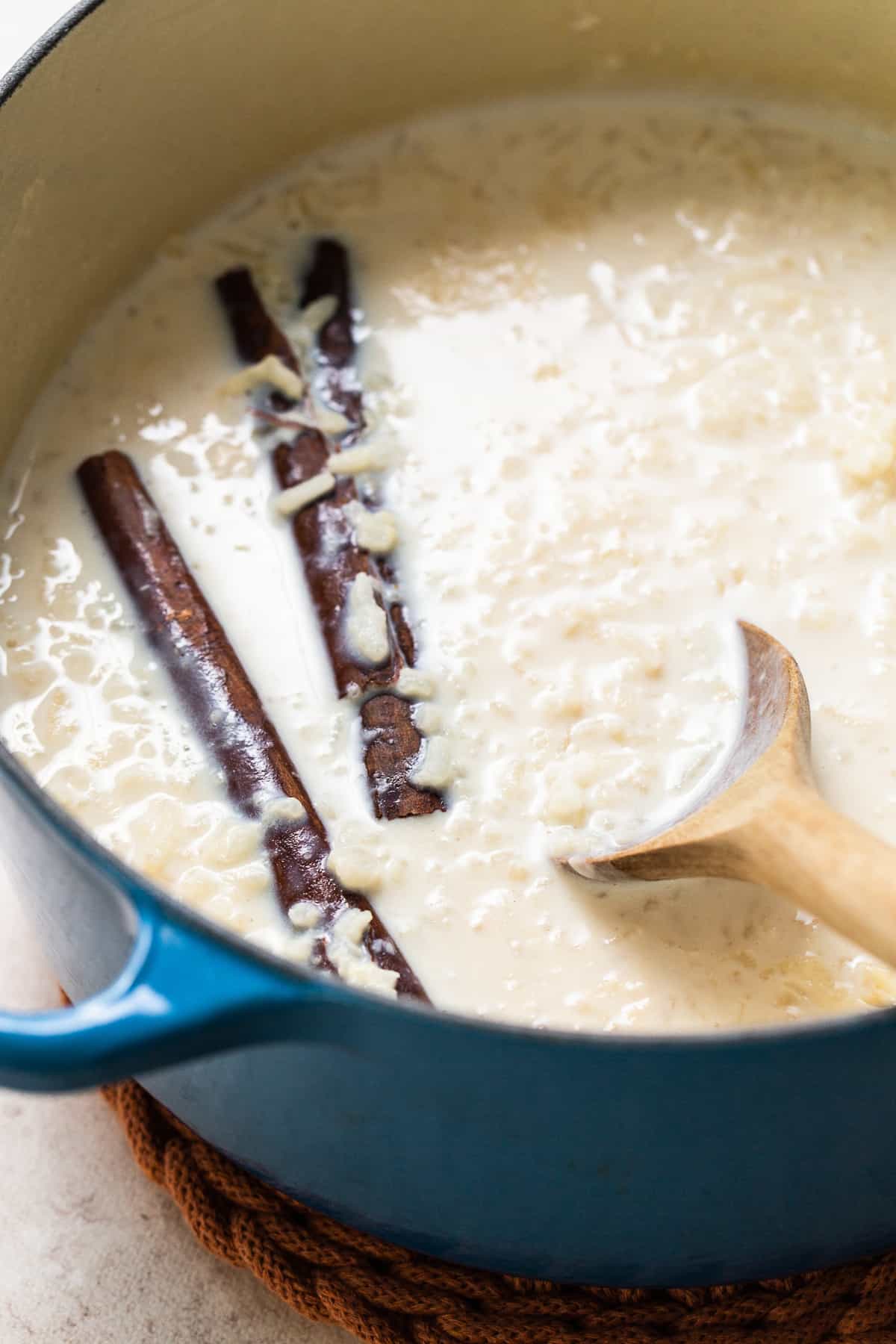 Long grain white rice cooked in a pot or Dutch oven with cinnamon sticks.