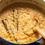 Pumpkin arroz con leche in a pot ready to eat.