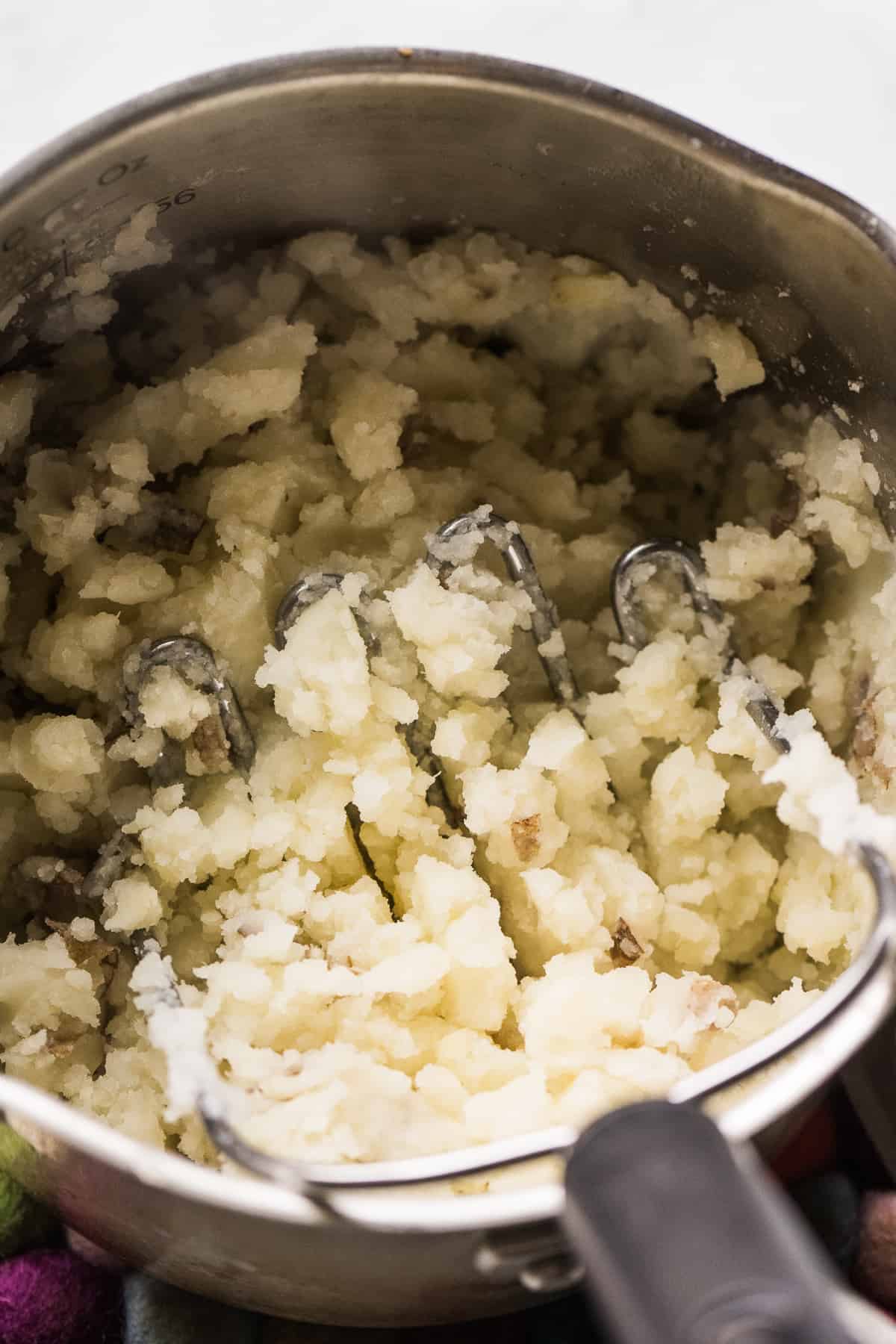 Mashed potatoes in a small pot.