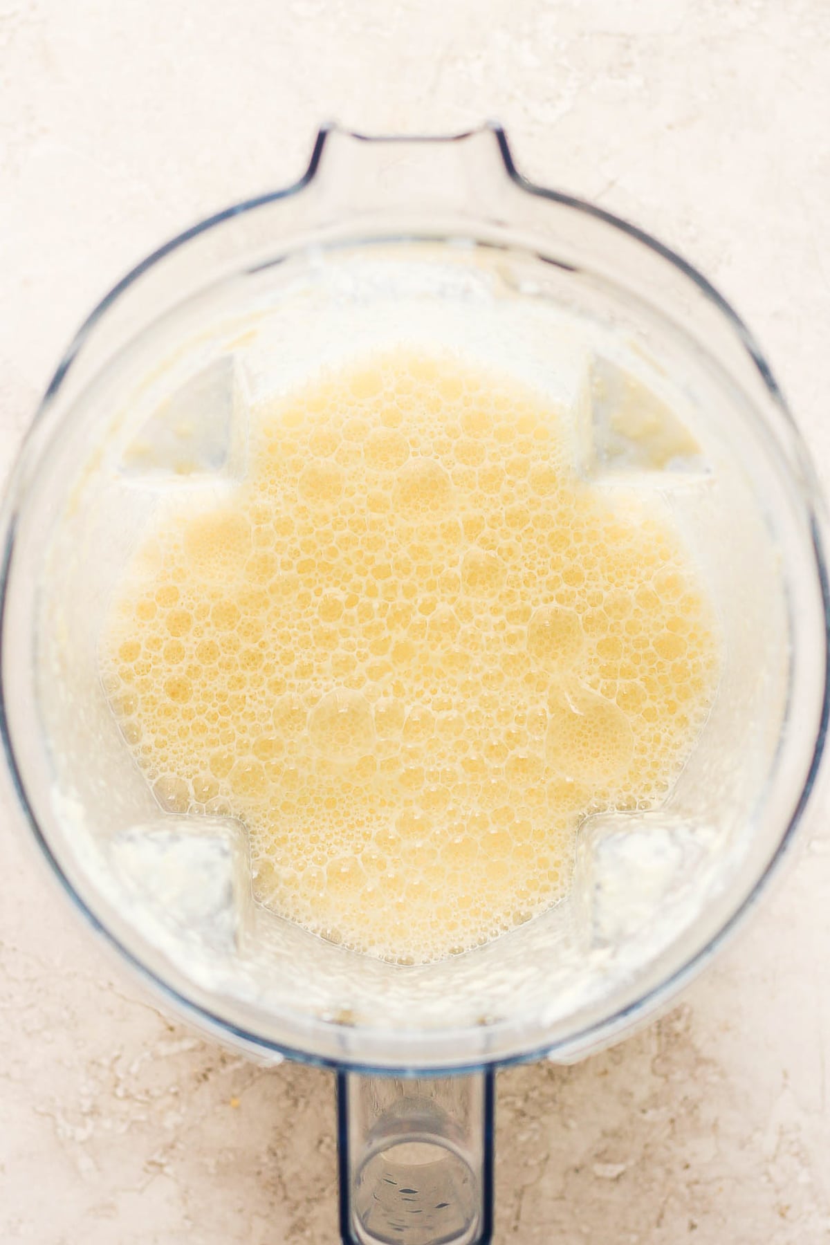 Blended milk and corn mixture in a blender.