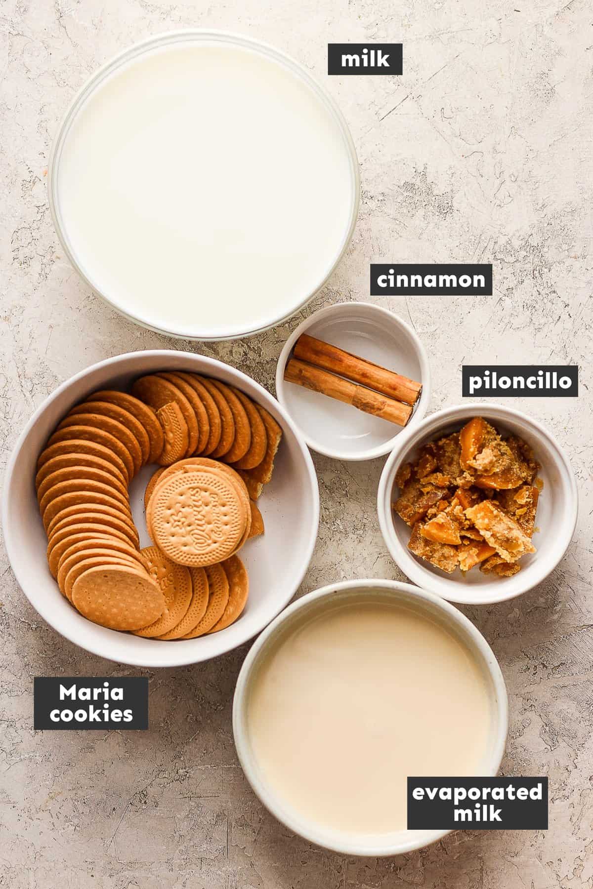 Ingredients for atole de galletas on a table.