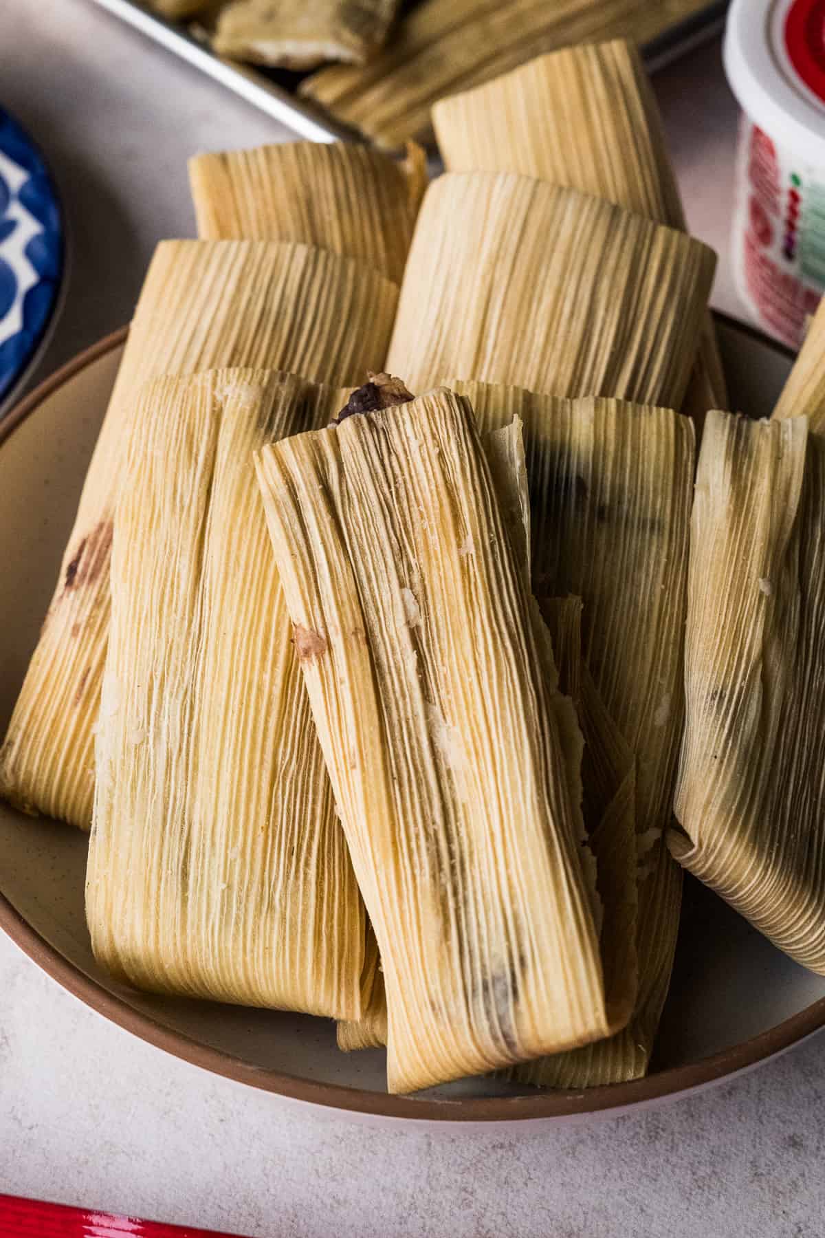 Bean and Cheese Tamales on a serving platter.