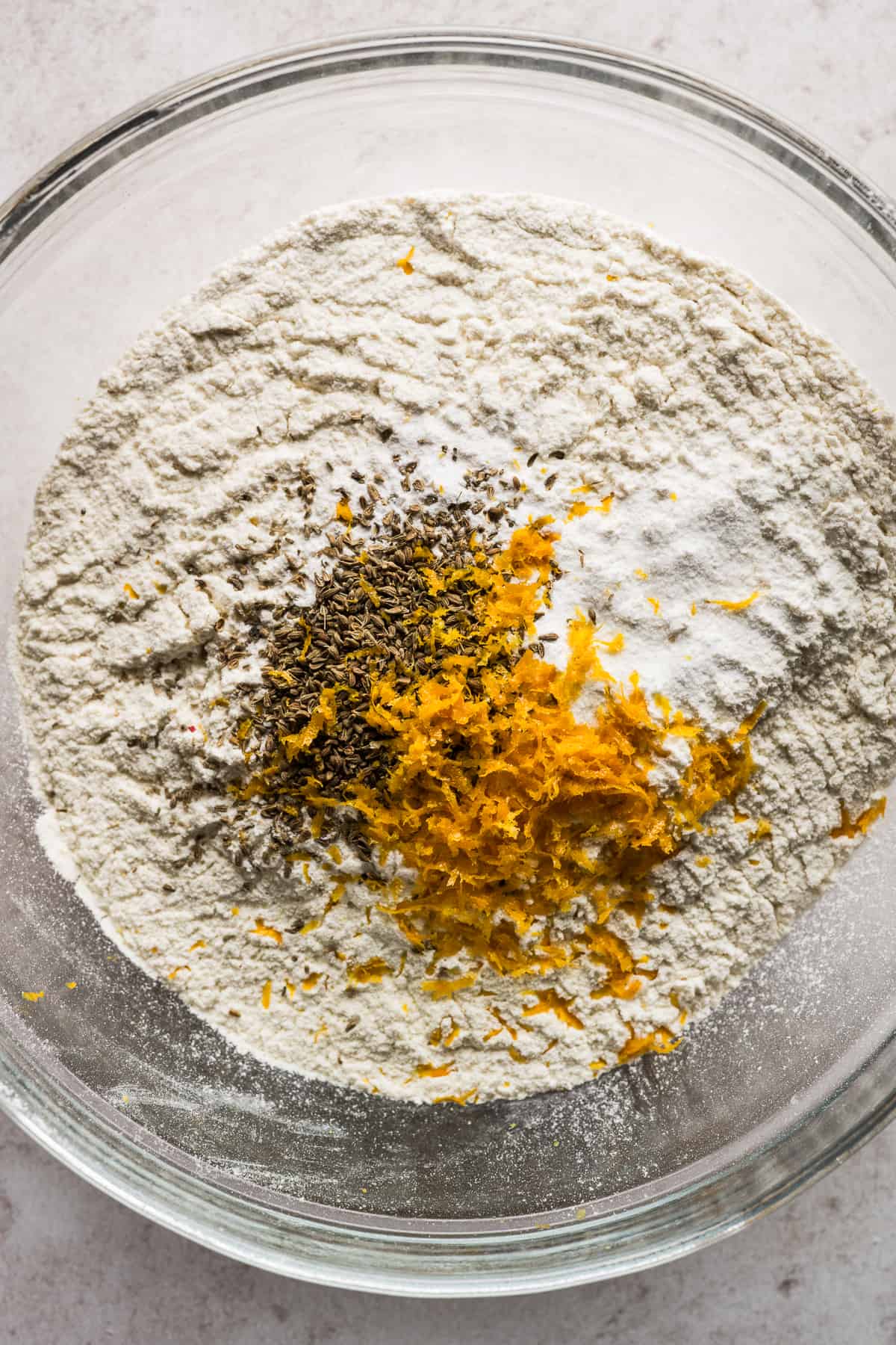 The dry ingredients for biscochito dough in a large bowl before being mixed together.