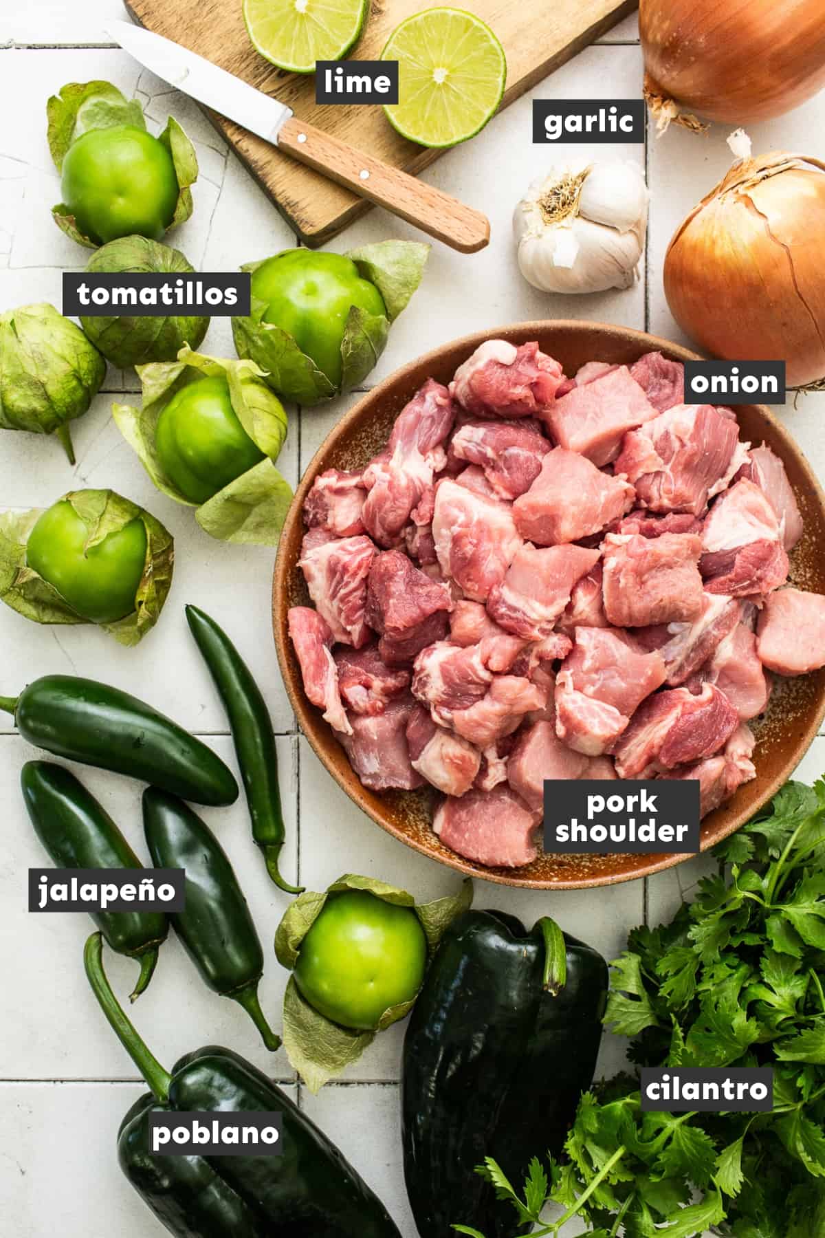 Ingredients in chile verde on a table.