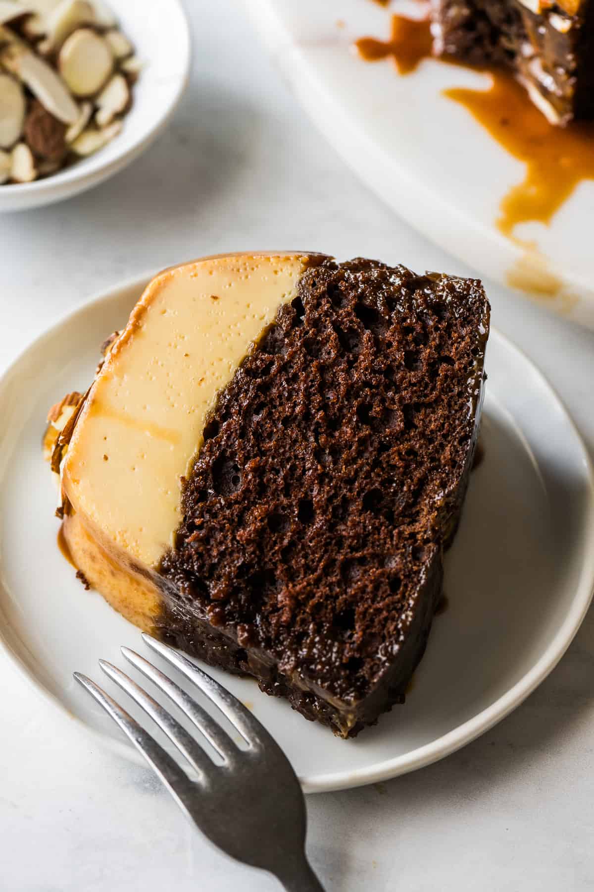 A slice of chocoflan on a plate.