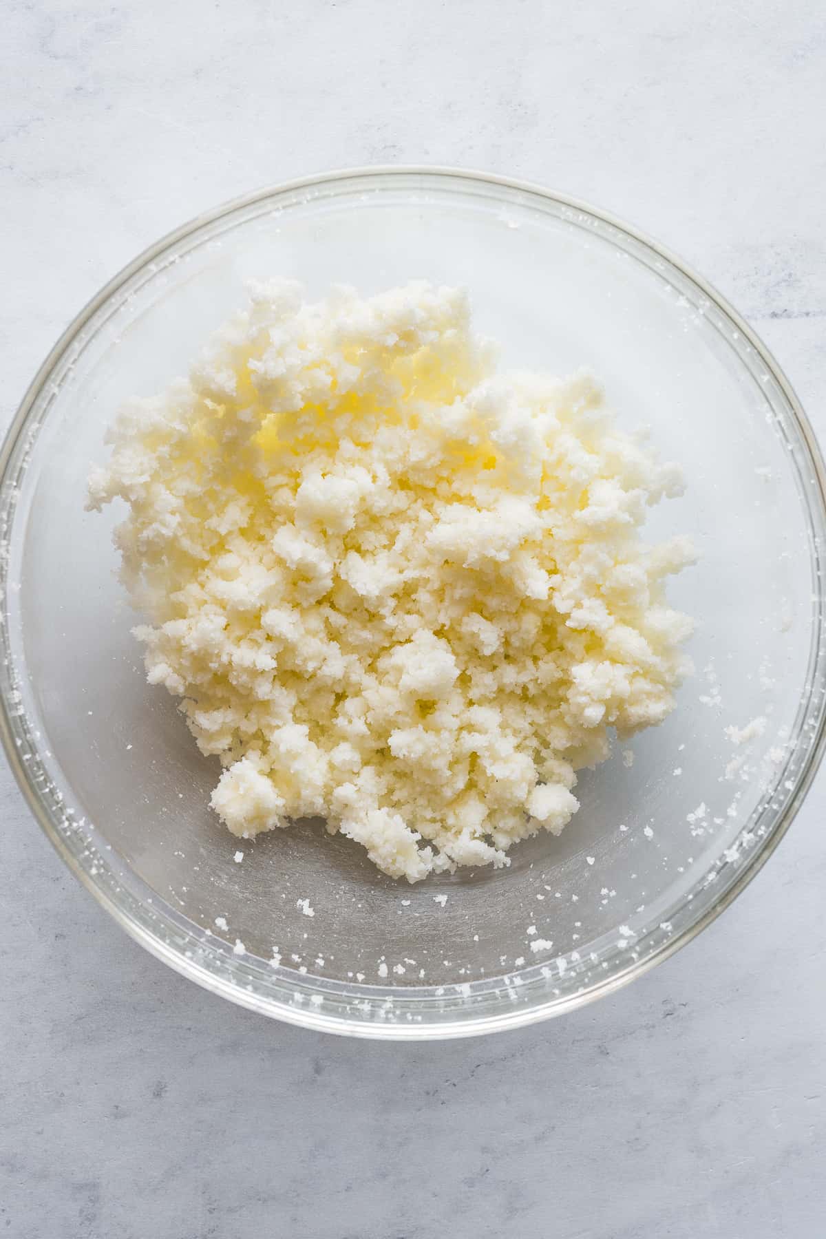 Creamed butter and sugar in a mixing bowl.